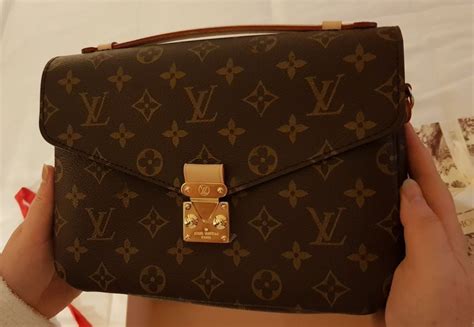 como saber si un bolso louis vuitton es original|carteras louis vuitton.